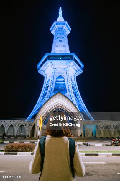 rear view image of a solo traveler woman in malaysia - perlis state park stock pictures, royalty-free photos & images