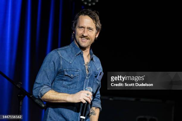 Rock and Roll Hall of Fame member Chris Shiflett of Foo Fighters performs onstage during Reel To Reel: They Called Us Outlaws at The GRAMMY Museum on...