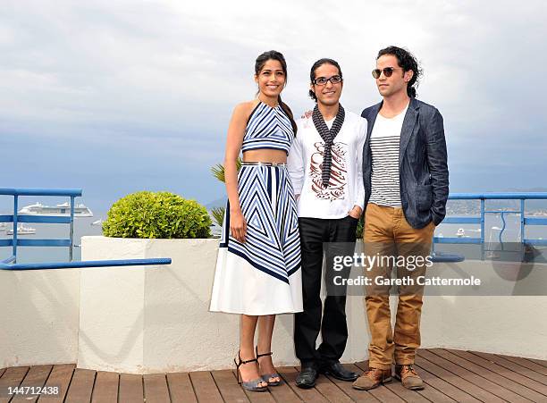 Actress Freida Pinto, Director Afshin Ghaffarin and Actor Reece Ritchie pose for a photocall during the 65th Annual Cannes Film Festival on May 18,...