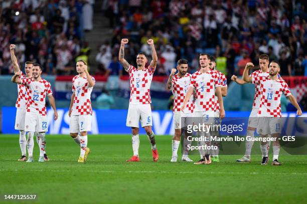 Josip Juranovic, Lovro Majer, Dejan Lovren, Borna Barisic and Nikola Vlasic of Croatia celebrate the victory during the FIFA World Cup Qatar 2022...
