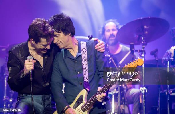 Brandon Flowers of The Killers and guitarist Johnny Marr performs live on the Pyramid stage during the 2019 Glastonbury Festival at Worthy Farm,...