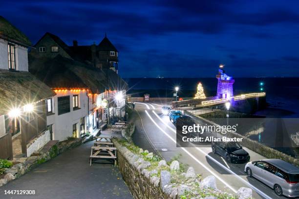 christmas lights in lynmouth, devon - exmoor national park night stock pictures, royalty-free photos & images