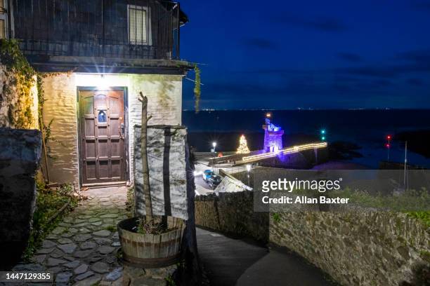 christmas lights in lynmouth, devon - exmoor national park night stock pictures, royalty-free photos & images