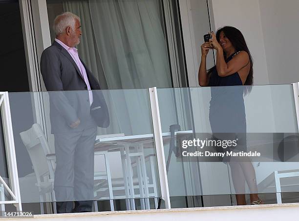 Jean Paul Belmondo and Barbara Gandolfi are seen at Edan Roc during the 65th Cannes Film Festival on May 17, 2012 in Antibes, France.