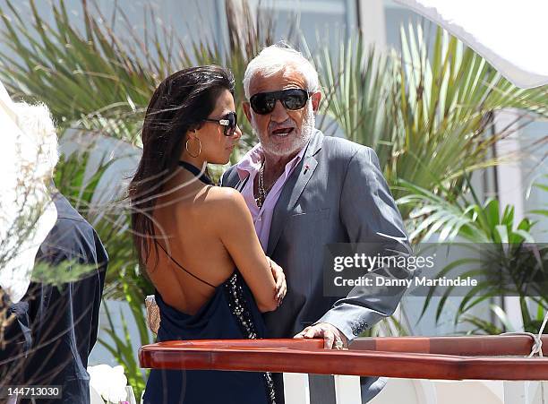 Jean Paul Belmondo and Barbara Gandolfi are seen at Edan Roc during the 65th Cannes Film Festival on May 17, 2012 in Antibes, France.