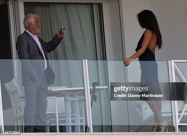 Jean Paul Belmondo and Barbara Gandolfi are seen at Edan Roc during the 65th Cannes Film Festival on May 17, 2012 in Antibes, France.