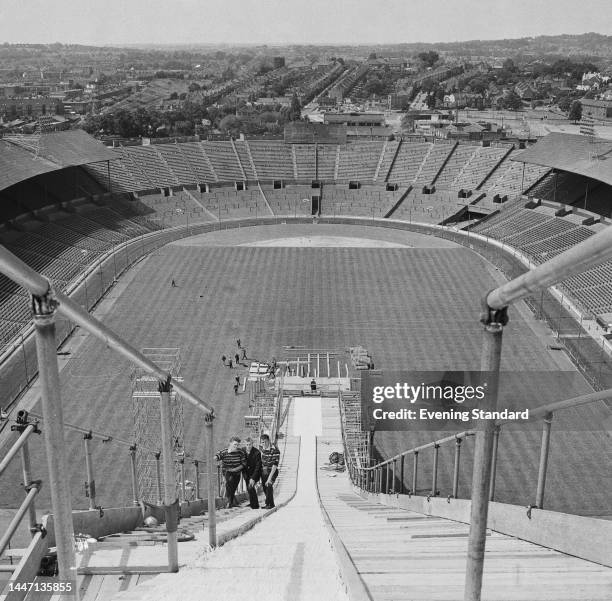 View from the top of a ski jumping ramp installed at Wembley Stadium in London for the International Ski Jumping Contest on May 31st, 1961.