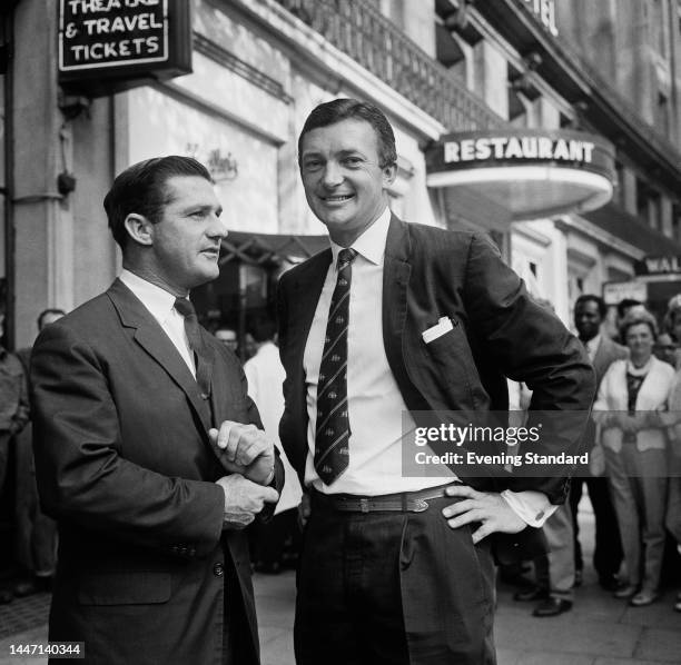 Vice Captain Neil Harvey and Captain Richie Benaud of the Australian cricket team outside the Waldorf Hotel in London on September 26th, 1961.