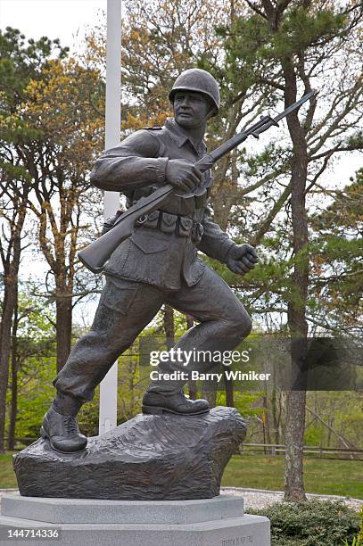 statue of military fighter with rifle. - hyannis port stock pictures, royalty-free photos & images
