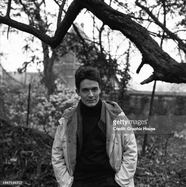 French actor Jacques Charrier wearing a black turtleneck sweater beneath an anorak, his hands in the pockets of his trousers, circa 1965.