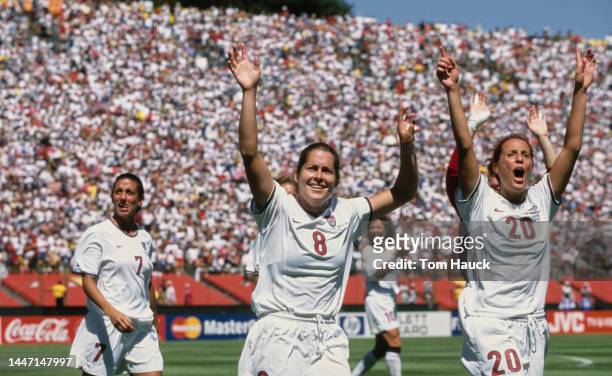 Shannon MacMillan, Kate Sobrero and Sara Whalen of the United States Women's Soccer team celebrate after winning the Final match of the FIFA Women's...