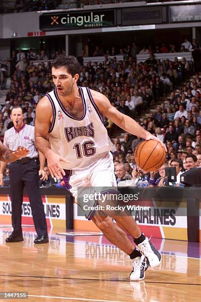 Peja Stojakovic of the Sacramento Kings drives to the basket during the Kings opening night game versus the Seattle SuperSonics at the ARCO Arena in...