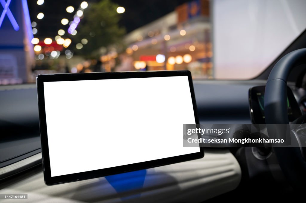A digital display screen on the dashboard of a modern car