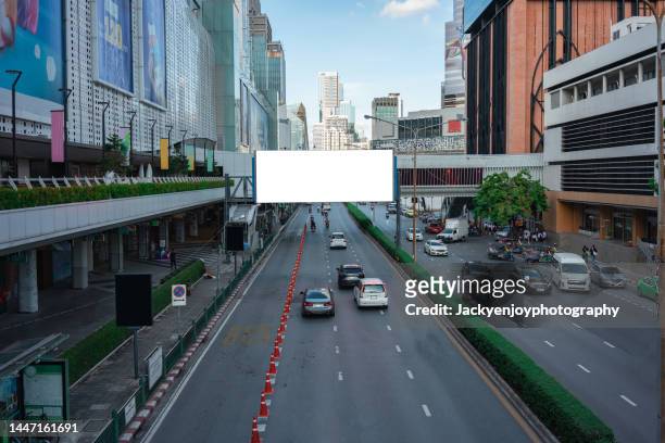 city billboard - billboard highway stock-fotos und bilder