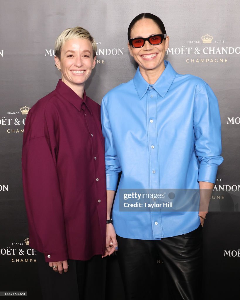 Megan Rapinoe and Sue Bird attend the 2022 Moet & Chandon Holiday
