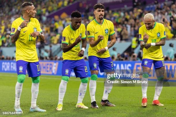 Vinicius Junior of Brazil dancing with Raphinha, Lucas Paqueta and Neymar after scoring the team's first goal during the FIFA World Cup Qatar 2022...