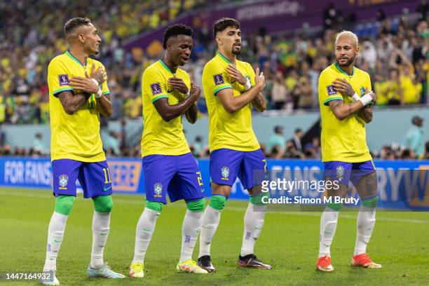 Vinicius Junior of Brazil dancing with Raphinha, Lucas Paqueta and Neymar after scoring the team's first goal during the FIFA World Cup Qatar 2022...