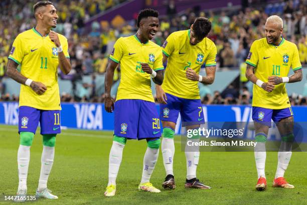 Vinicius Junior of Brazil dancing with Raphinha, Lucas Paqueta and Neymar after scoring the team's first goal during the FIFA World Cup Qatar 2022...