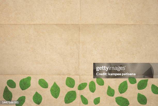 abstract background from texture of brown toilet paper. - paper napkin stock-fotos und bilder