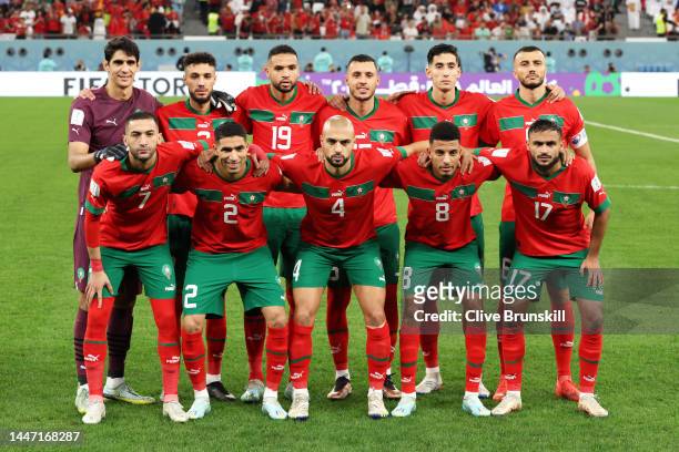 Morocco players line up for team photos prior to the FIFA World Cup Qatar 2022 Round of 16 match between Morocco and Spain at Education City Stadium...