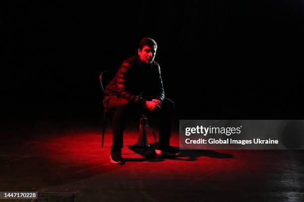 An actor plays performance on a theater stage on December 2, 2022 in Odesa, Ukraine. The premiere of a documentary performance "It is possible to...