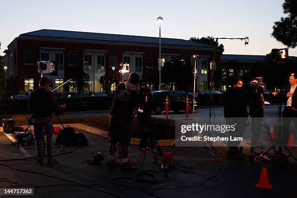 The media gather and prepare for broadcast outside the Facebook headquarters on May 18, 2012 in Menlo Park, California. The eight-year-old social...