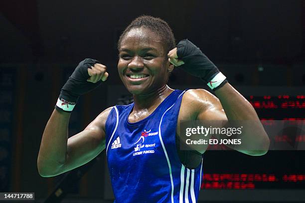 Nicola Adams of England gestures following her win against Elena Savelyeva of Russia during their flyweight semi-final bout at the Women's World...