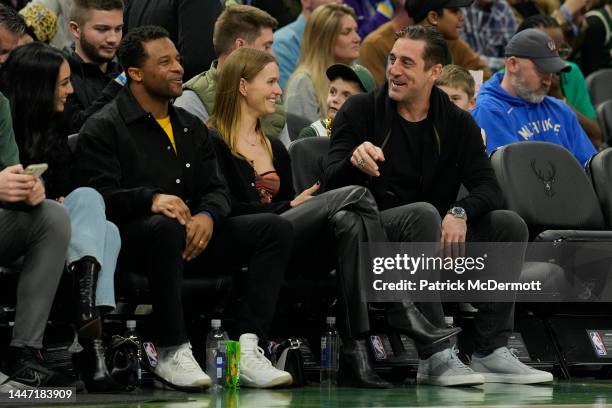 Green Bay Packers wide receiver Randall Cobb, Mallory Edens, and Green Bay Packers quarterback Aaron Rodgers watch the second half of the game...