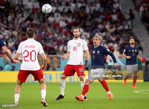 Grzegorz Krychowiak of Poland, Antoine Griezmann of France during the FIFA World Cup Qatar 2022 Round of 16 match between France and Poland at Al...
