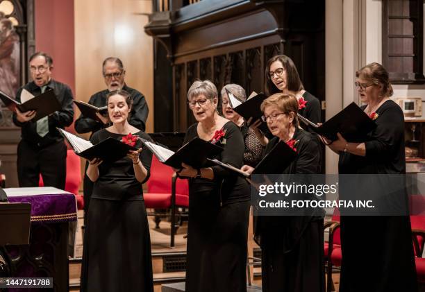 church choir during performance at concert - koor stockfoto's en -beelden
