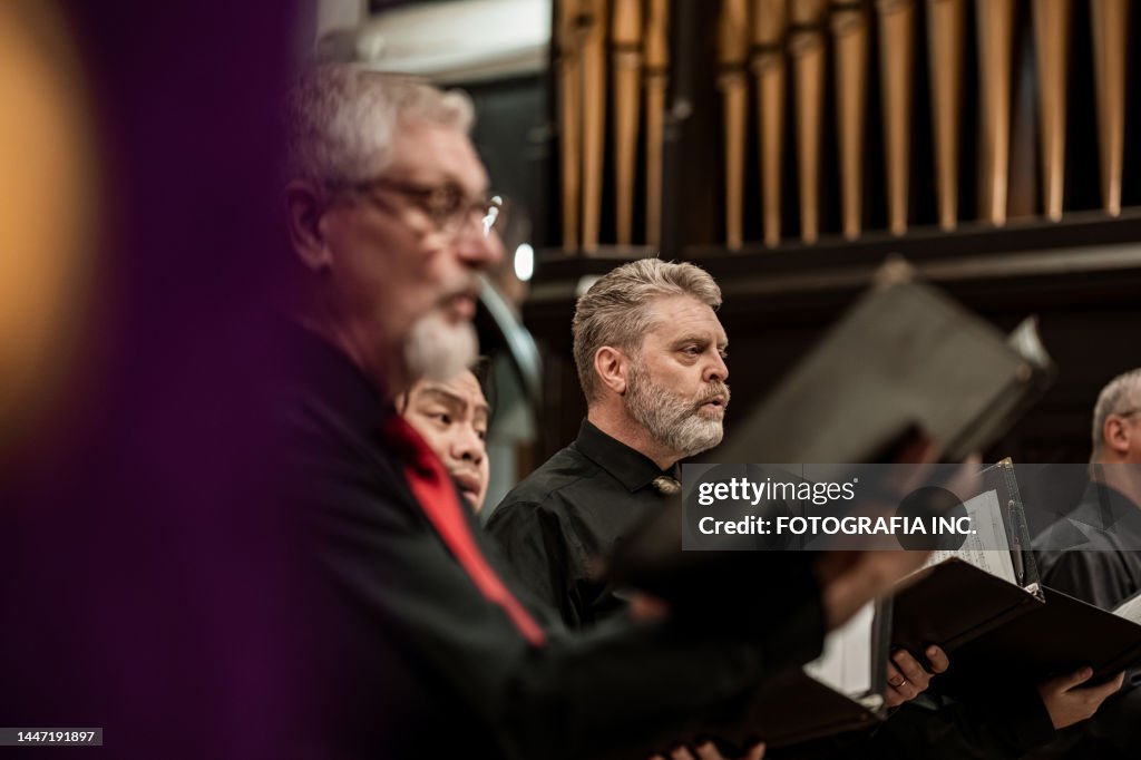 Men singers in Church Choir during performance at Concert