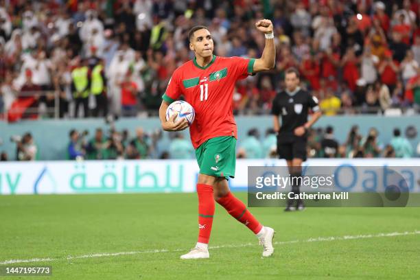 Abdelhamid Sabiri of Morocco celebrates scoring the team's first penalty in the penalty shoot out during the FIFA World Cup Qatar 2022 Round of 16...