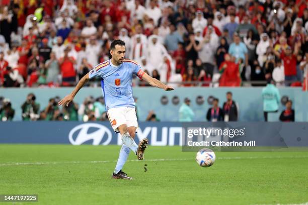 Sergio Busquets of Spain shoots the team's third penalty saved by Yassine Bounou of Morocco in the penalty shoot out during the FIFA World Cup Qatar...