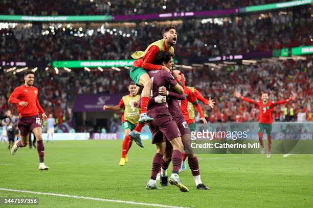 Achraf Hakimi of Morocco celebrates after the team's victory in the penalty shoot out during the FIFA World Cup Qatar 2022 Round of 16 match between...