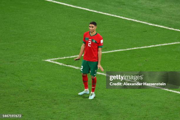 Achraf Hakimi of Morocco celebrates after the team's victory in the penalty shoot out during the FIFA World Cup Qatar 2022 Round of 16 match between...