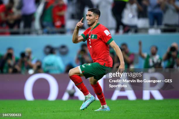 Achraf Hakimi of Marocco celebrates victory after penalty shootout during the FIFA World Cup Qatar 2022 Round of 16 match between Morocco and Spain...