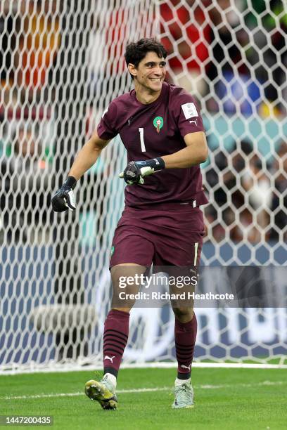 Yassine Bounou of Morocco celebrates after saving a penalty by Sergio Busquets of Spain in the penalty shoot out during the FIFA World Cup Qatar 2022...