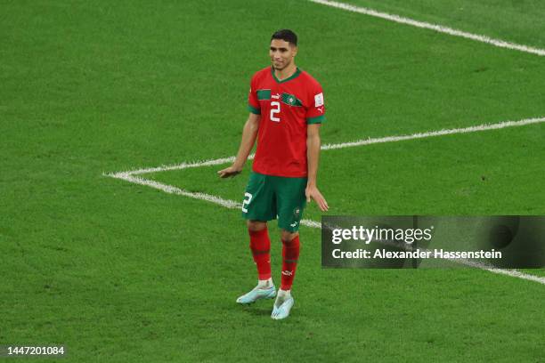 Achraf Hakimi of Morocco celebrates after scoring the team's fourth and winning penalty in the penalty shoot out during the FIFA World Cup Qatar 2022...