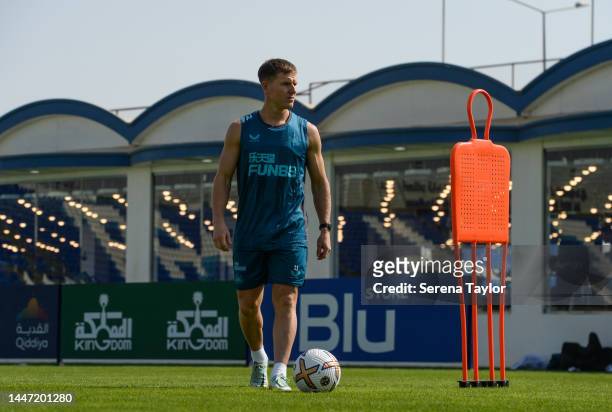 Matt Ritchie controls the ball during the Newcastle United Training Session at the Al Hilal FC Training Centre on December 06, 2022 in Riyadh, Saudi...