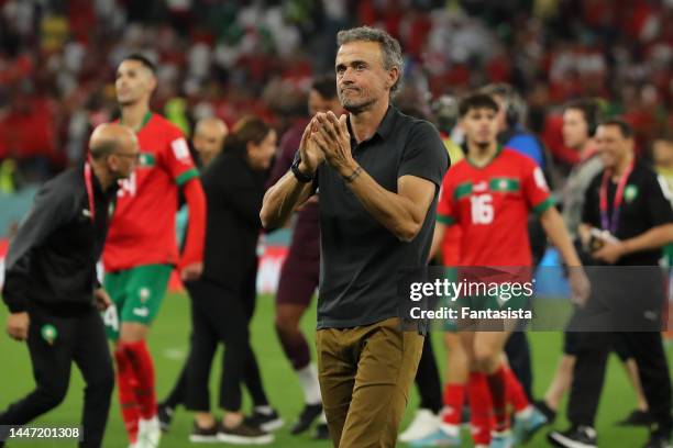 Luis Enrique Head coach of Spain applauds the fans following the penalty shoot out in the FIFA World Cup Qatar 2022 Round of 16 match between Morocco...