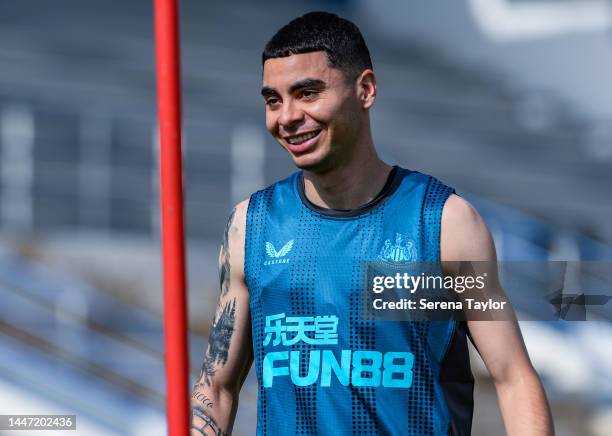 Miguel Almirón smiles during the Newcastle United Training Session at the Al Hilal FC Training Centre on December 06, 2022 in Riyadh, Saudi Arabia.