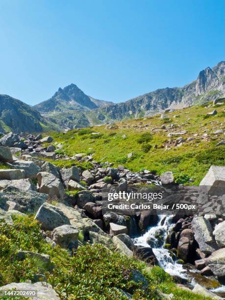 scenic view of rocky mountains against clear sky - turquía stock-fotos und bilder