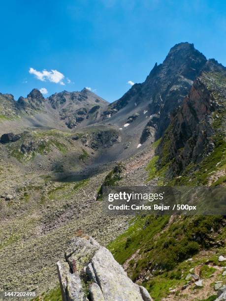 scenic view of mountains against blue sky - turquía stock-fotos und bilder