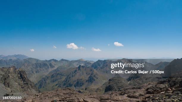 scenic view of mountains against blue sky - turquía stock-fotos und bilder