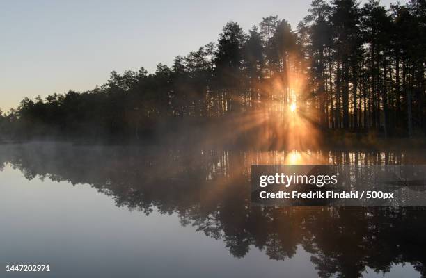 scenic view of lake against sky at sunset,sweden - sverige landskap stock pictures, royalty-free photos & images