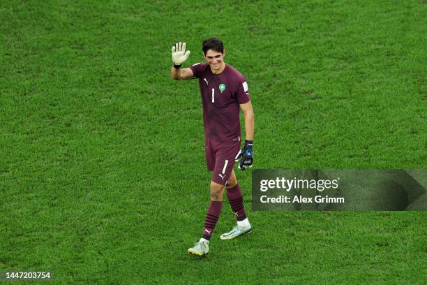Yassine Bounou of Morocco applauds fans after their win in the penalty shoot out during the FIFA World Cup Qatar 2022 Round of 16 match between...