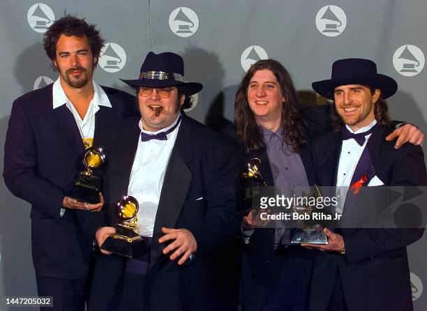 Rock band Blues Traveler Winners : Chan Kinchla, John Popper, Bobby Sheehan and Brendan Hill at the 38th Annual Grammy Awards, February 28, 1996 in...
