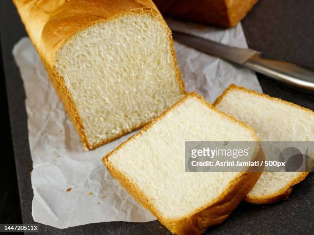 high angle view of bread slices on table,indonesia - white bread - fotografias e filmes do acervo