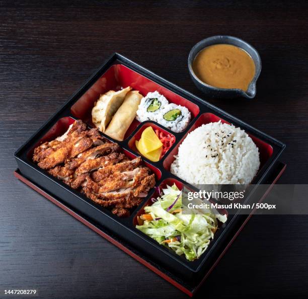 high angle view of food in tray on table,aylesbury,united kingdom,uk - bento box stock pictures, royalty-free photos & images