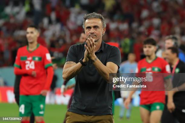 Luis Enrique Head coach of Spain applauds the fans following the penalty shoot out in the FIFA World Cup Qatar 2022 Round of 16 match between Morocco...